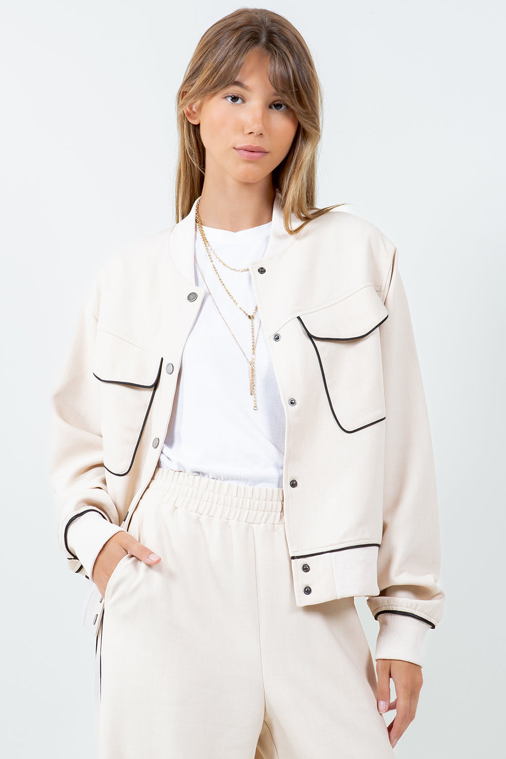 CONTRAST PIPING DETAILED VARSITY BOMBER JACKET - BEIGE