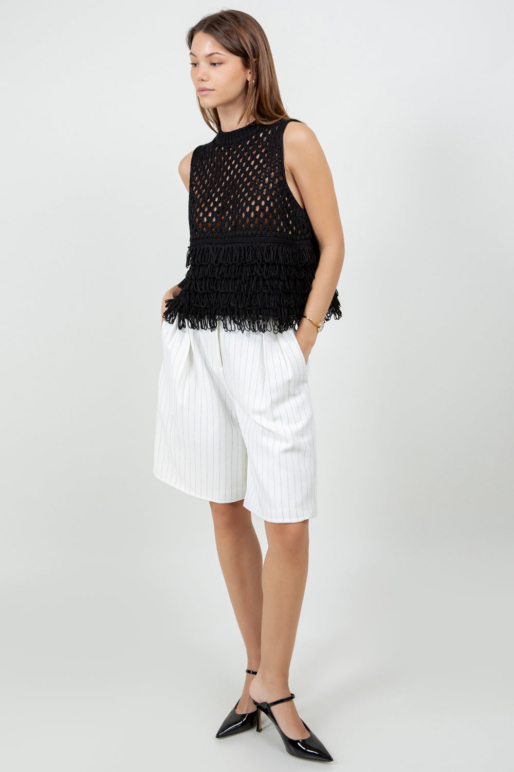 KNITTED SLEEVELESS SWEATER WITH FRINGE DETAILING - BLACK