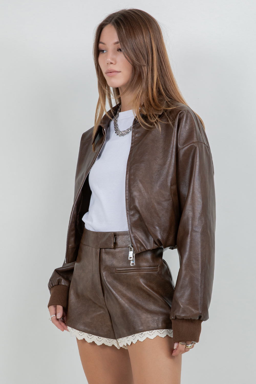 FAUX LEATHER ZIP UP MOTO JACKET WITH MINI BUBBLE BOTTOM OPENING - DK BROWN - Whiteroom+Cactus