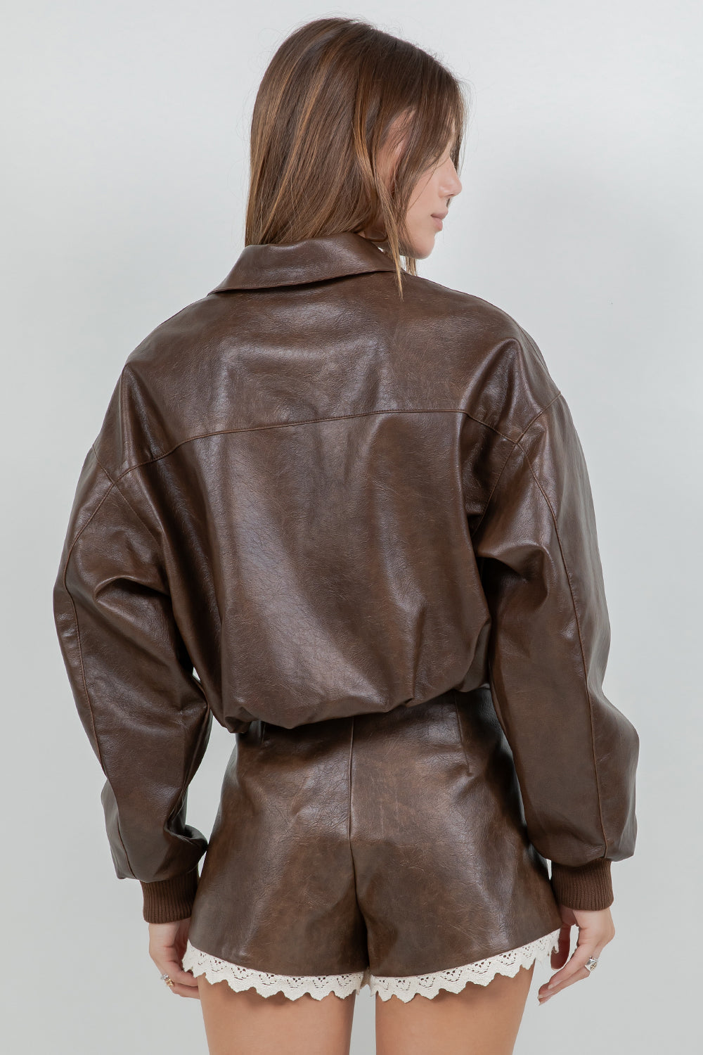 FAUX LEATHER ZIP UP MOTO JACKET WITH MINI BUBBLE BOTTOM OPENING - DK BROWN - Whiteroom+Cactus