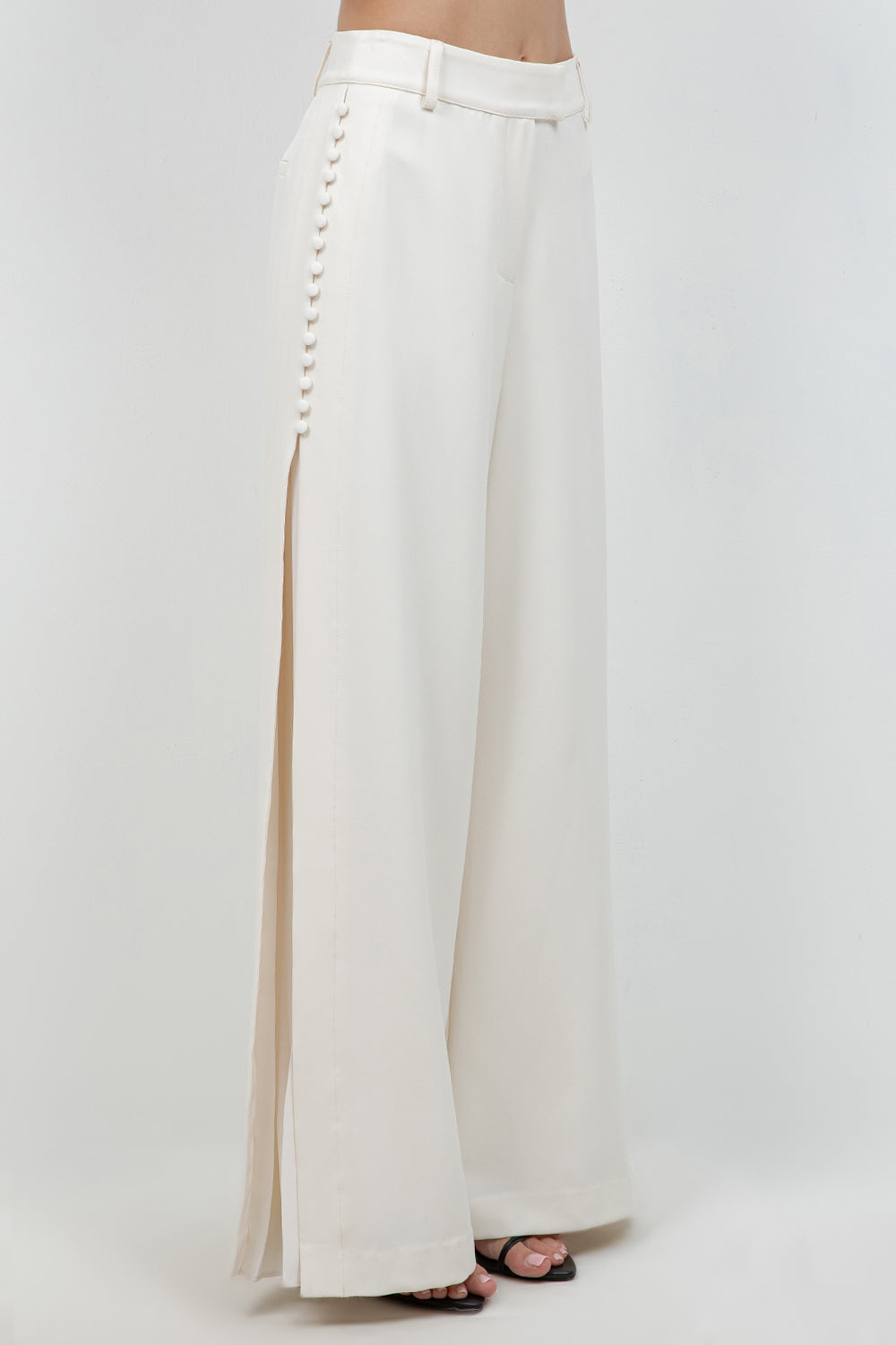 BUTTON DOWN SIDE PLEAT DETAILED SOFT WOVEN TROUSERS