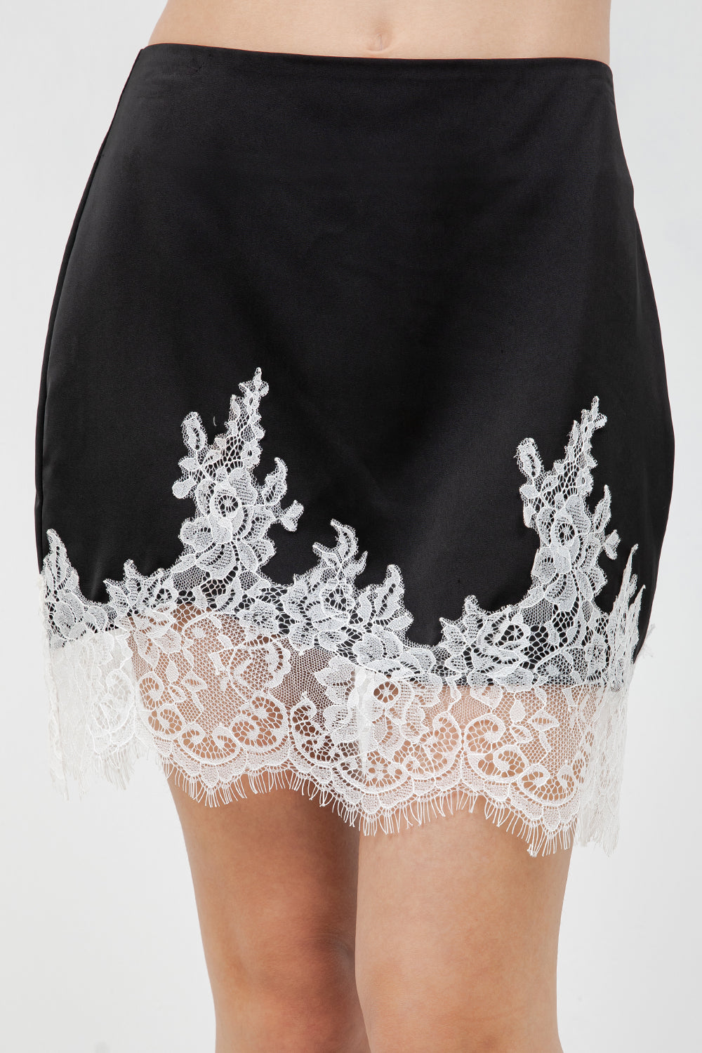 MINI SKIRT WITH CONTRAST LACE HEMMING