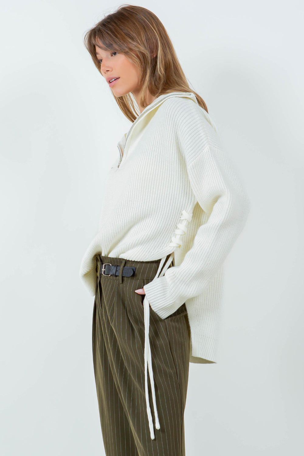 ZIP UP KNIT TOP WITH TIE SIDE DRAWSTRING DETAIL - IVORY