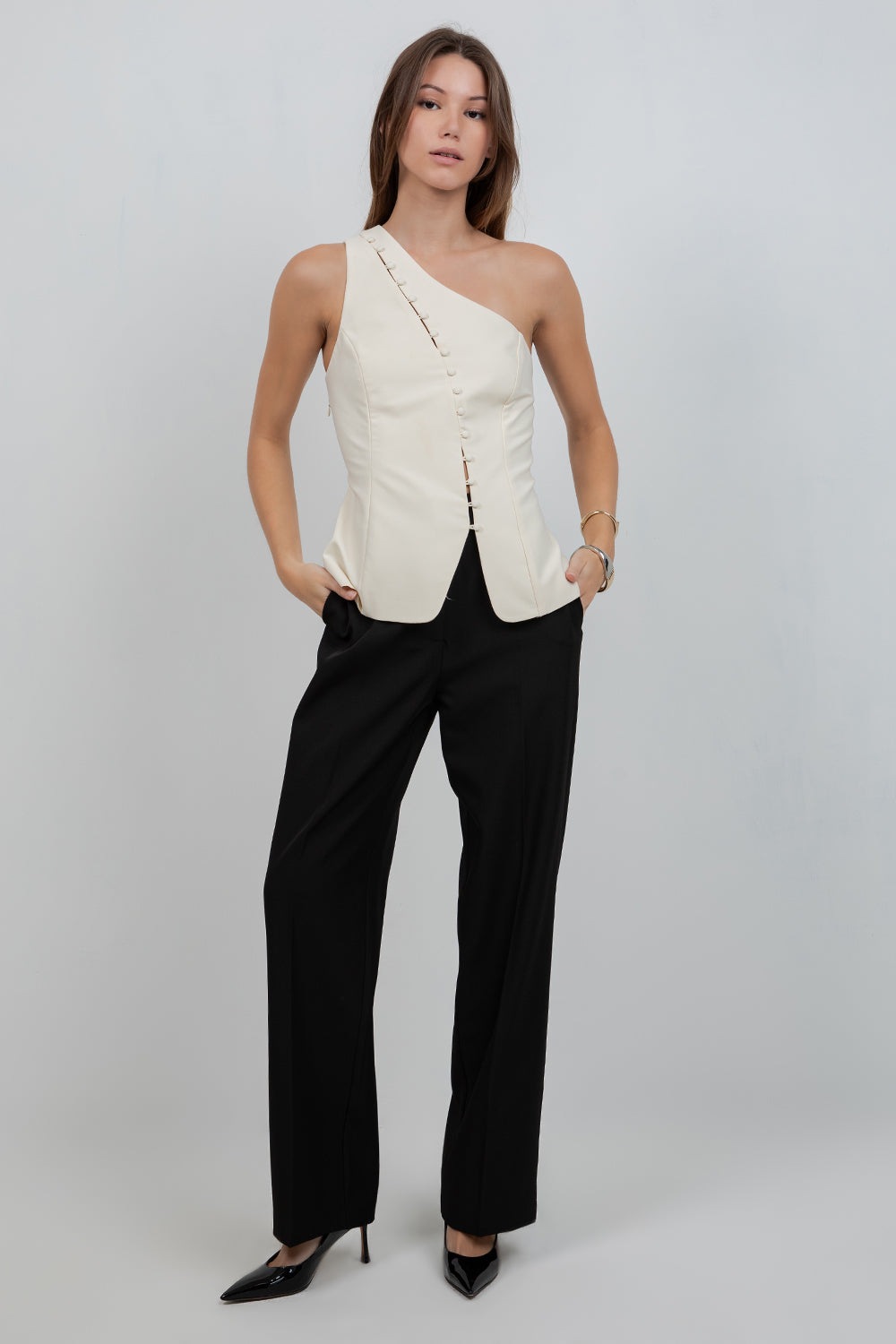 STRUCTURED WOVEN ASYMMETRICAL SLEEVELESS TOP WITH BUTTON ACCENT