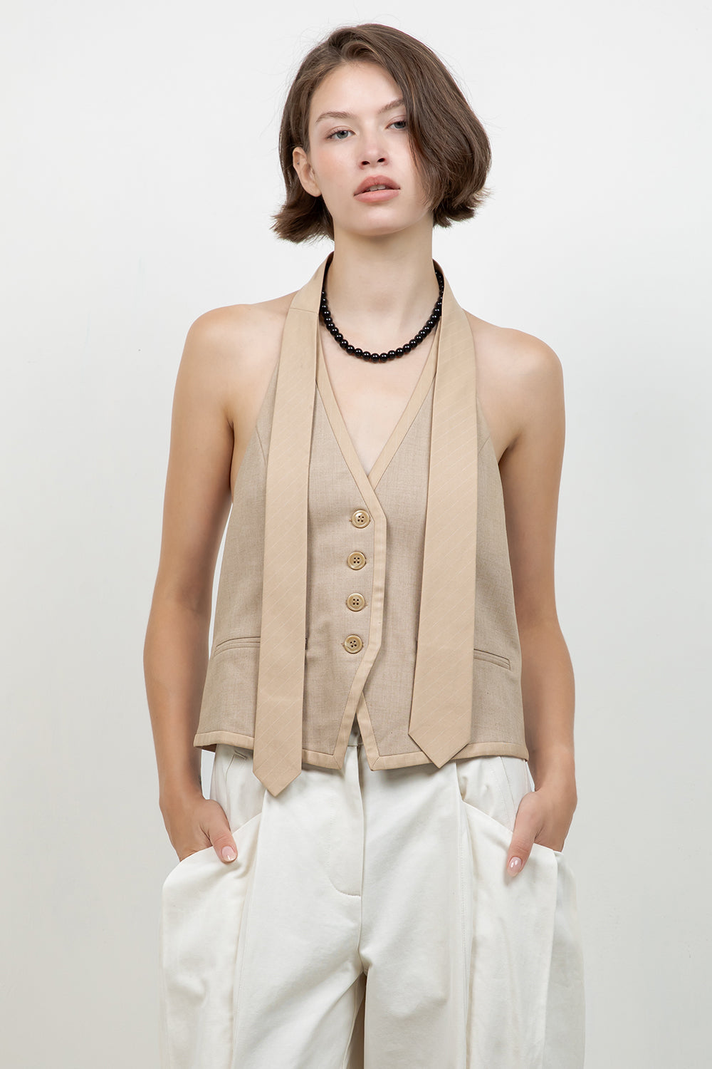 WOVEN BUTTON DOWN VEST WITH CONTRAST NECK TIE