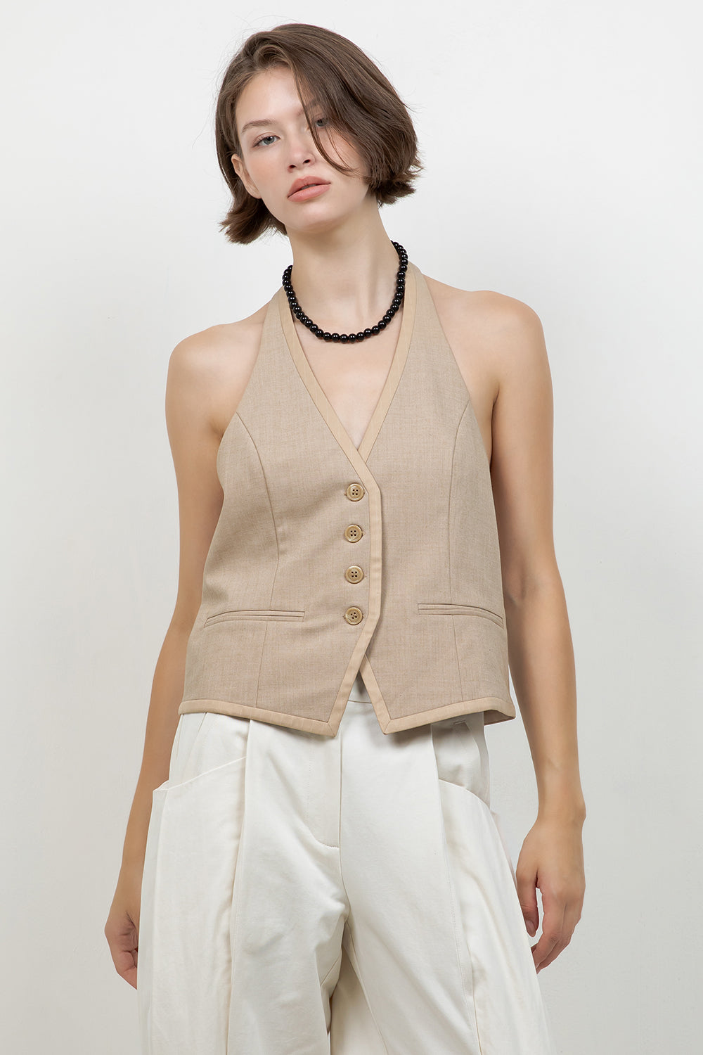 WOVEN BUTTON DOWN VEST WITH CONTRAST NECK TIE