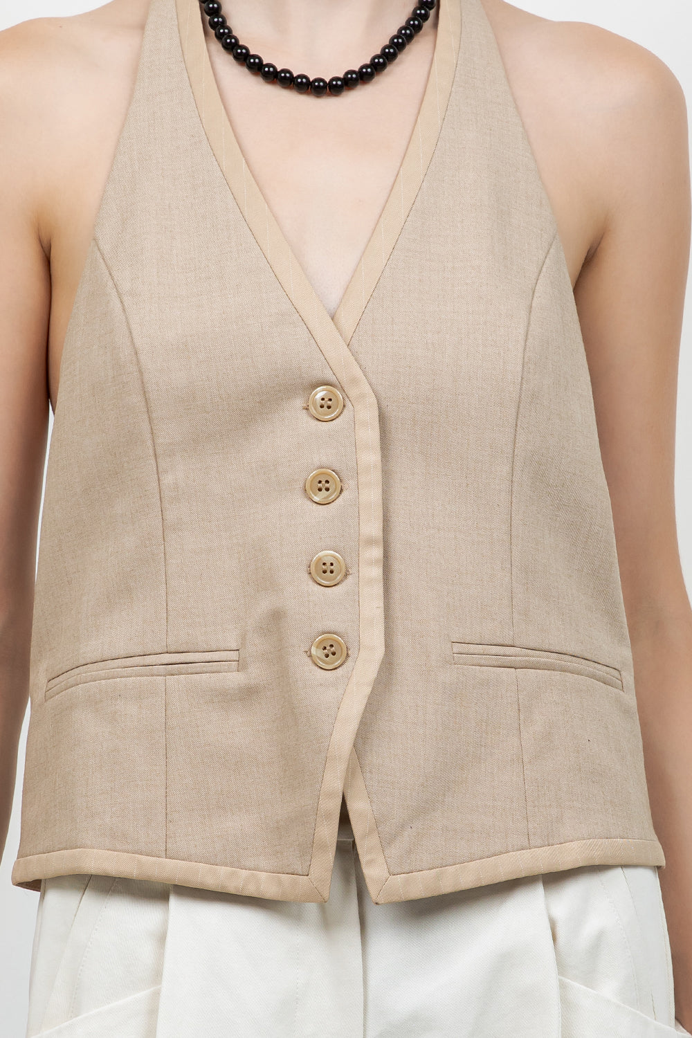 WOVEN BUTTON DOWN VEST WITH CONTRAST NECK TIE