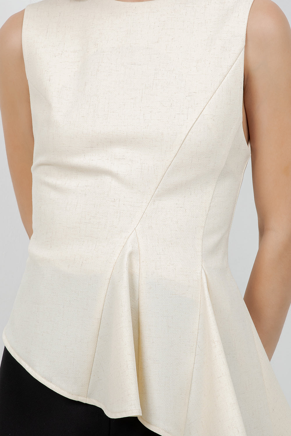 SLEEVELESS ASYMMETRICAL RUFFLE TOP