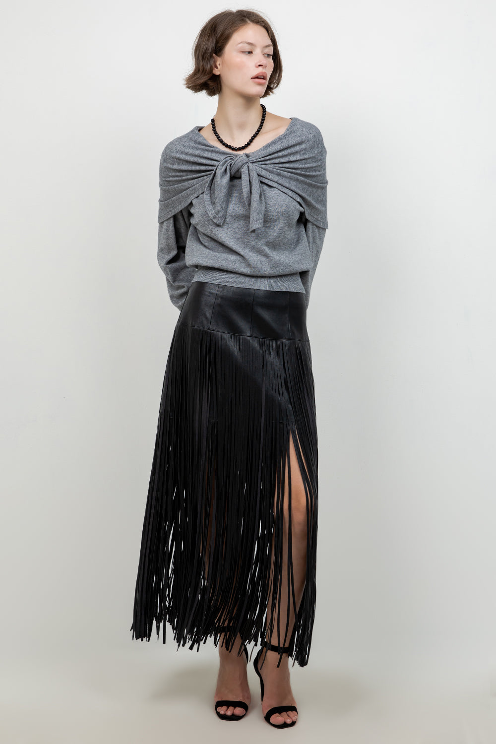 FAUX LEATHER PU SKIRT WITH FRINGE ACCENT DETAILS