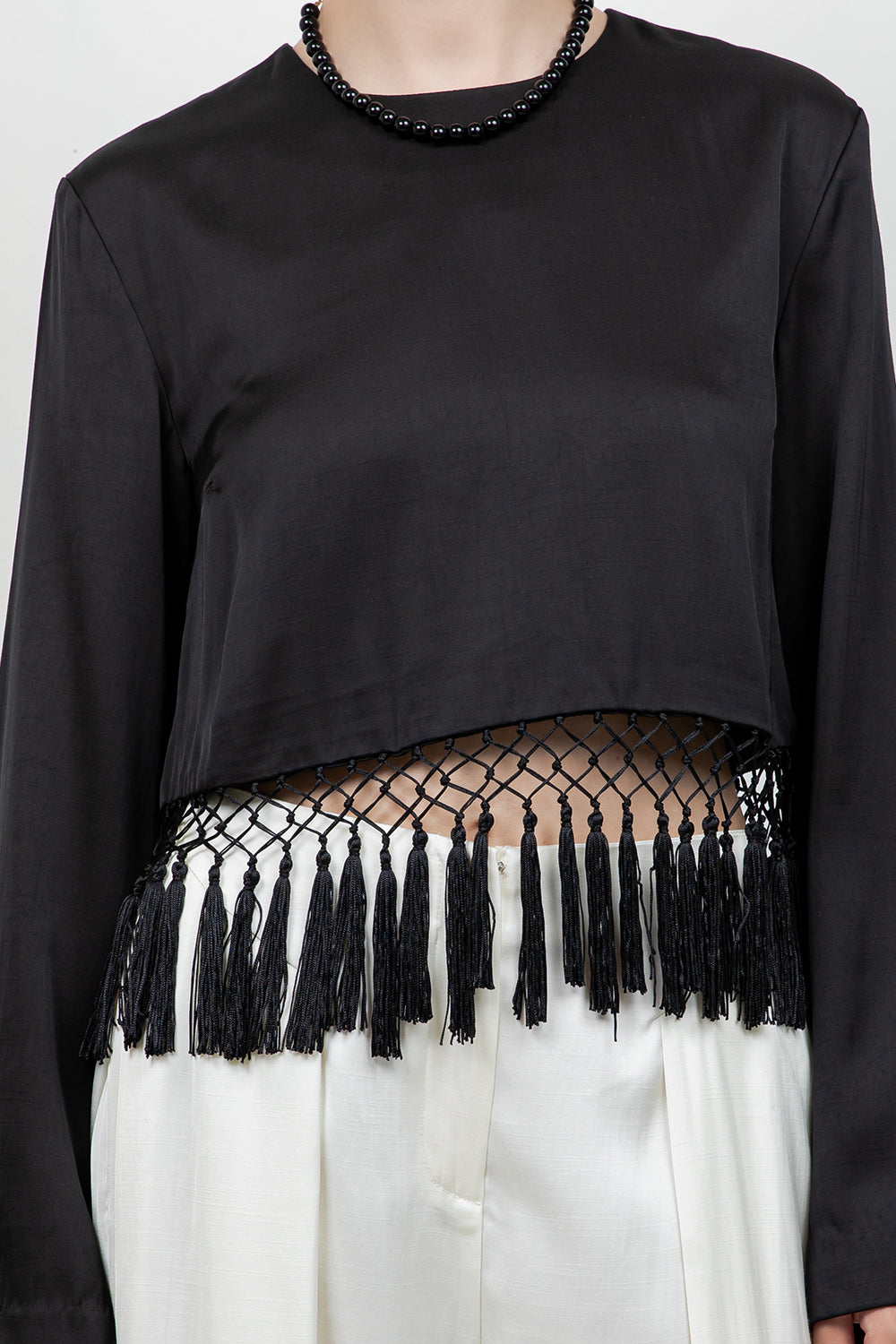 SATIN LONG SLEEVE BLOUSE WITH TASSEL ACCENT