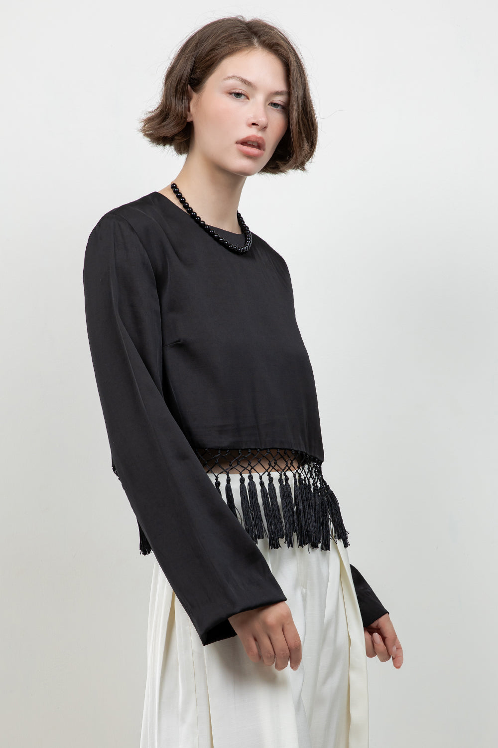 SATIN LONG SLEEVE BLOUSE WITH TASSEL ACCENT