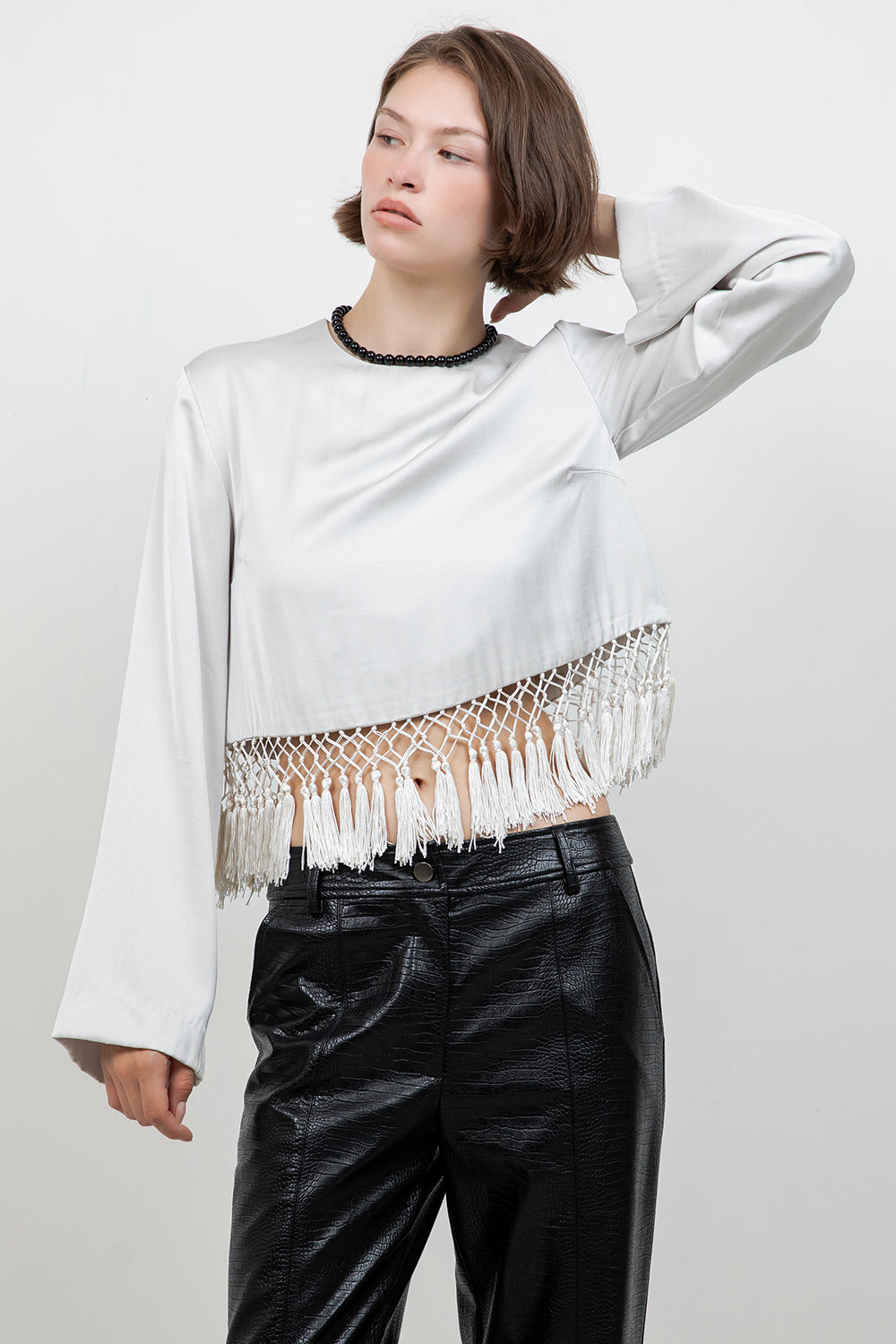 SATIN LONG SLEEVE BLOUSE WITH TASSEL ACCENT