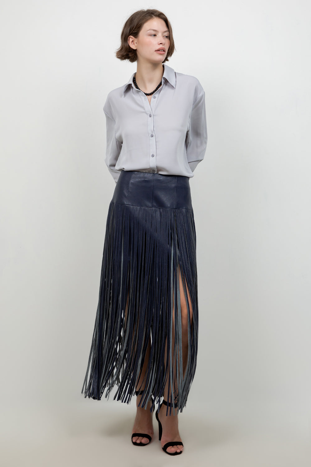 FAUX LEATHER PU SKIRT WITH FRINGE ACCENT DETAILS