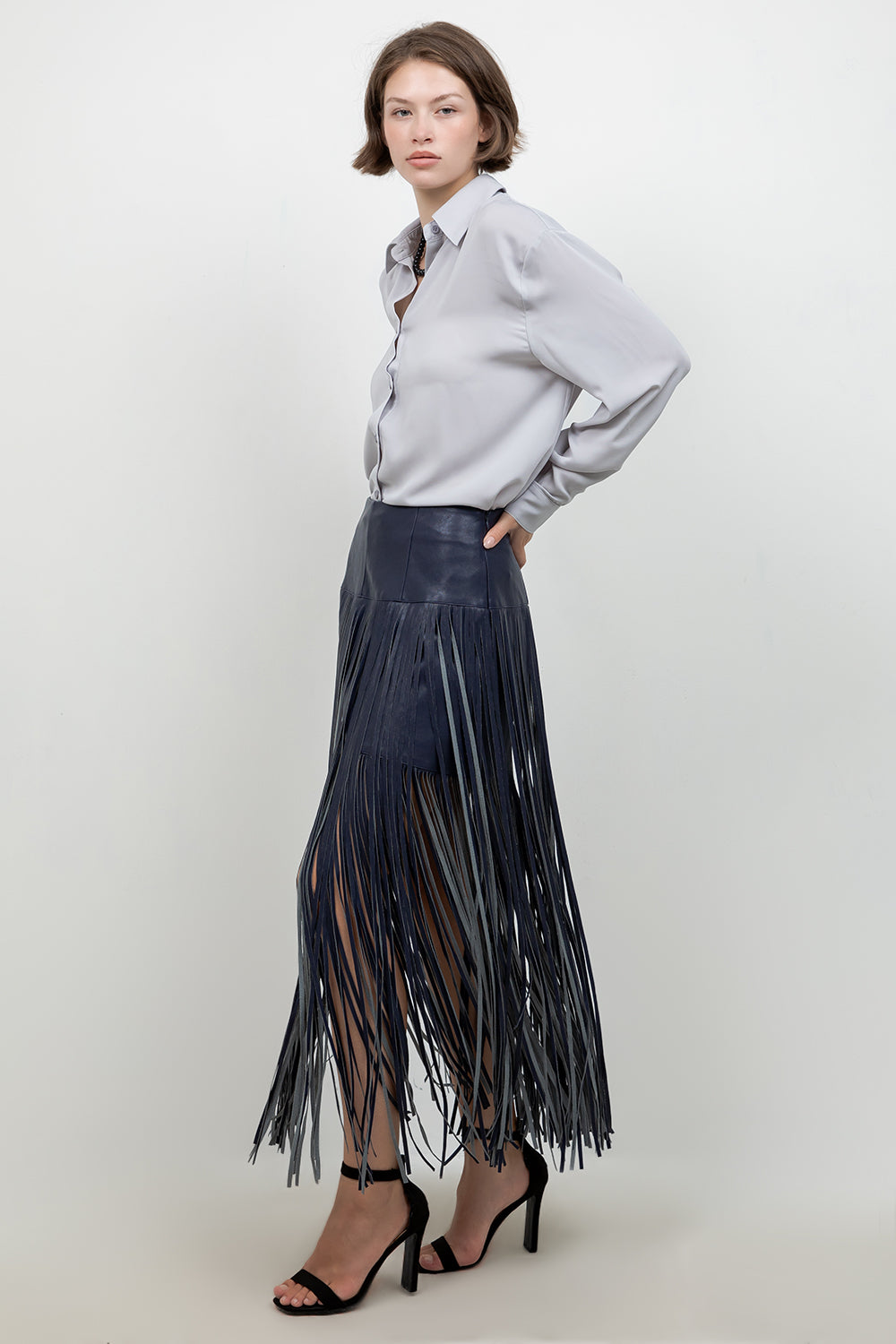 FAUX LEATHER PU SKIRT WITH FRINGE ACCENT DETAILS